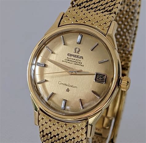 omega uhr gold mit omega zeichen auf der zwölf|More.